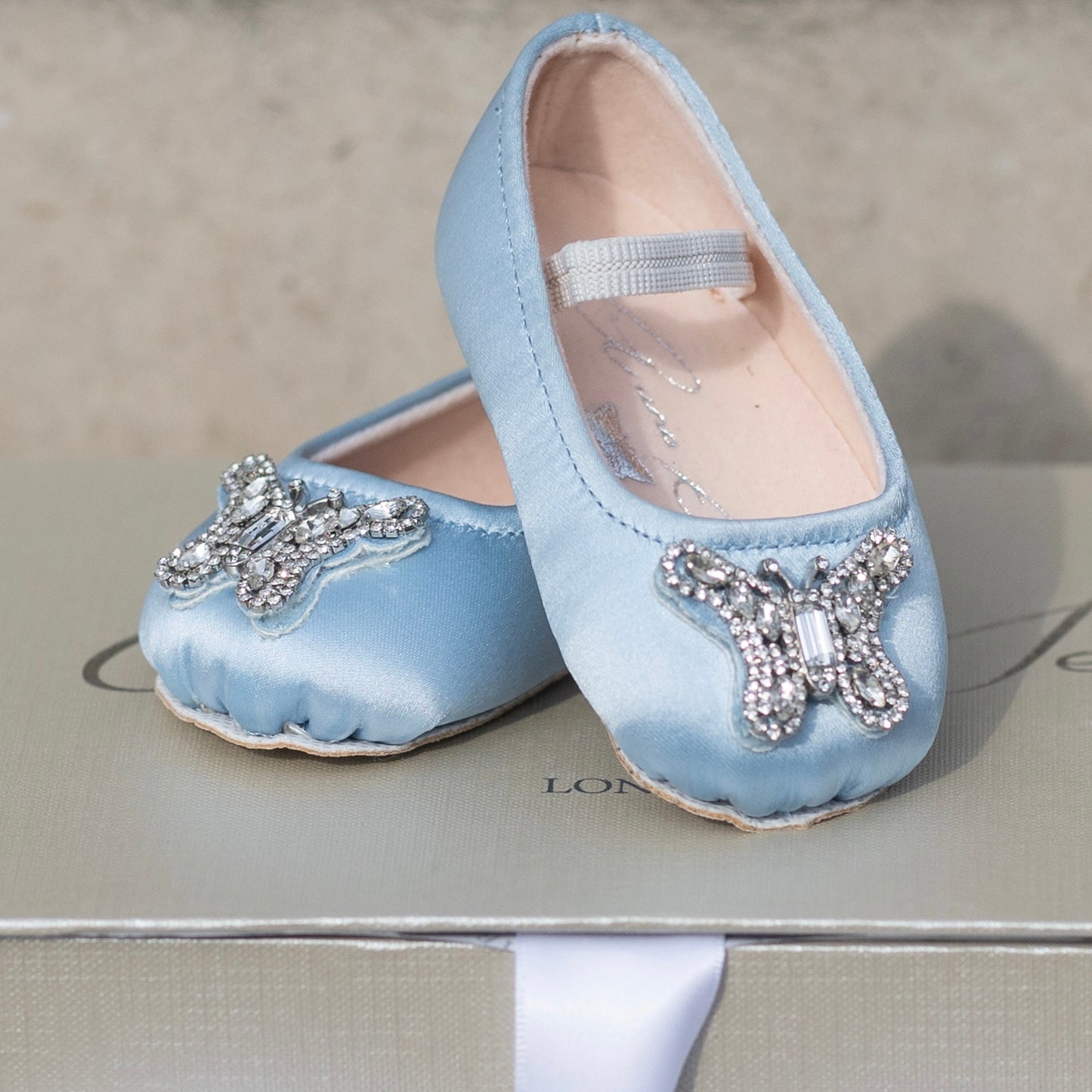 lue satin baby girl pre-walker shoes for flower girls, featuring elegant lace overlay and soft satin finish for luxury celebrations.