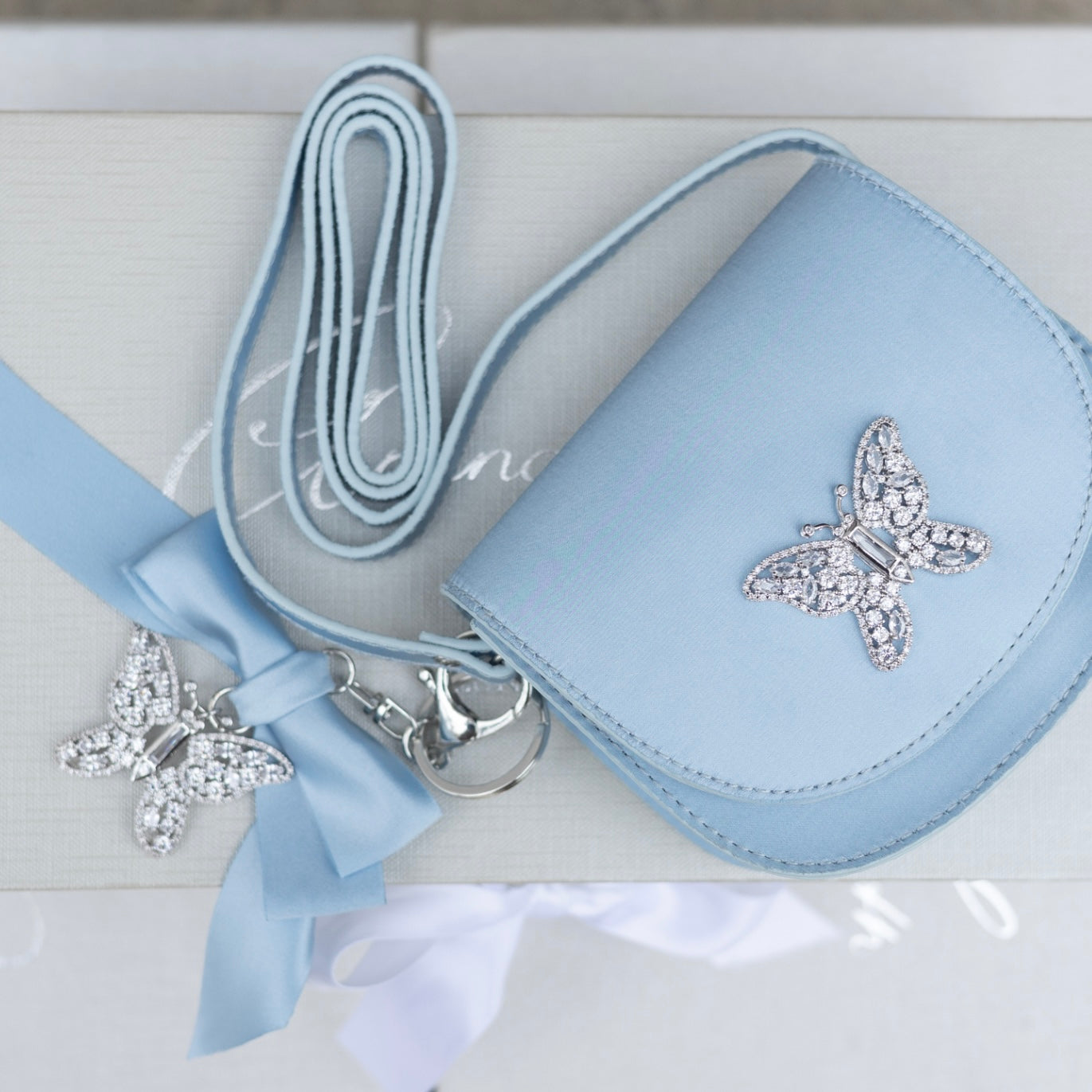 Luna Mini Butterfly Powder Blue Satin Bag