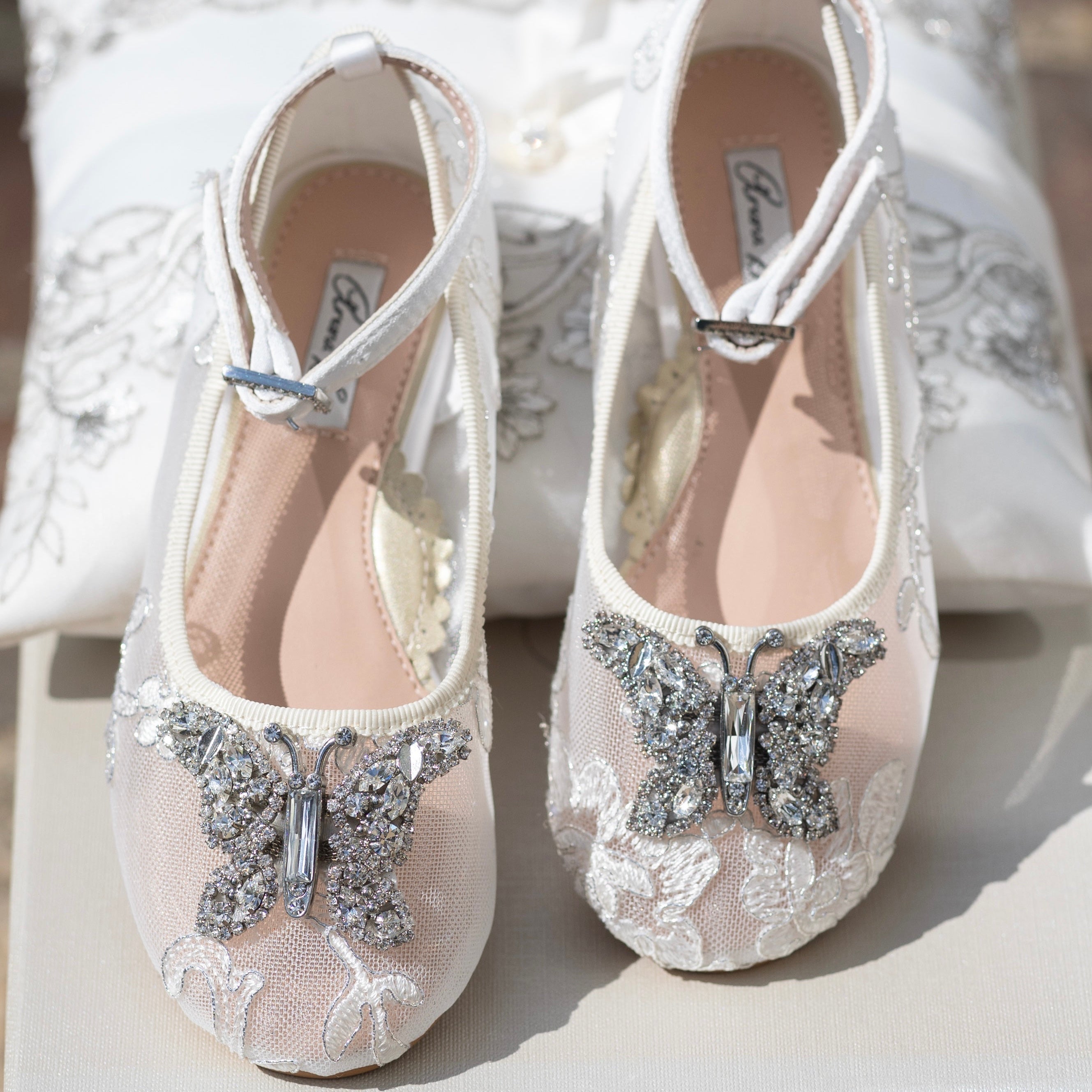 Ivory Chantilly lace wedding shoes for flower girls, luxury style with handcrafted details and premium satin materials.